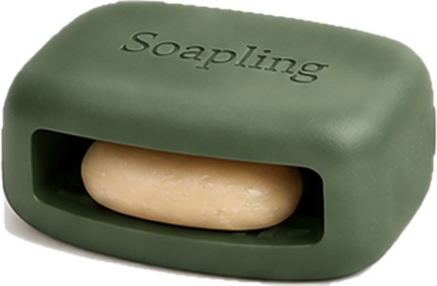A deep sage Soapling bar with an old soap sliver tucked into its side pocket